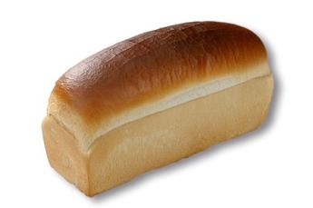 Ambachtelijk Melk brood 
half gesneden